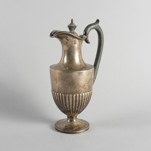A SILVER HOT WATER JUG