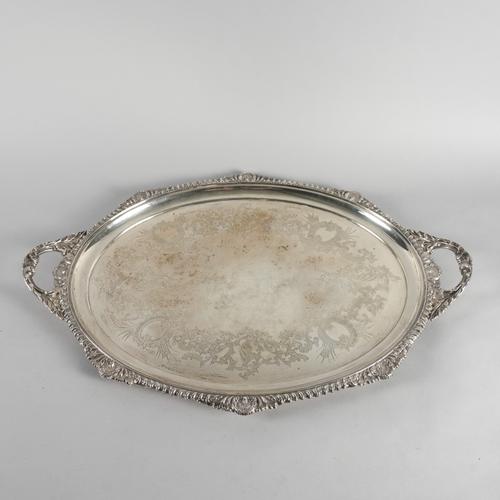 A SILVER LARGE OVAL TWIN HANDLED TRAY