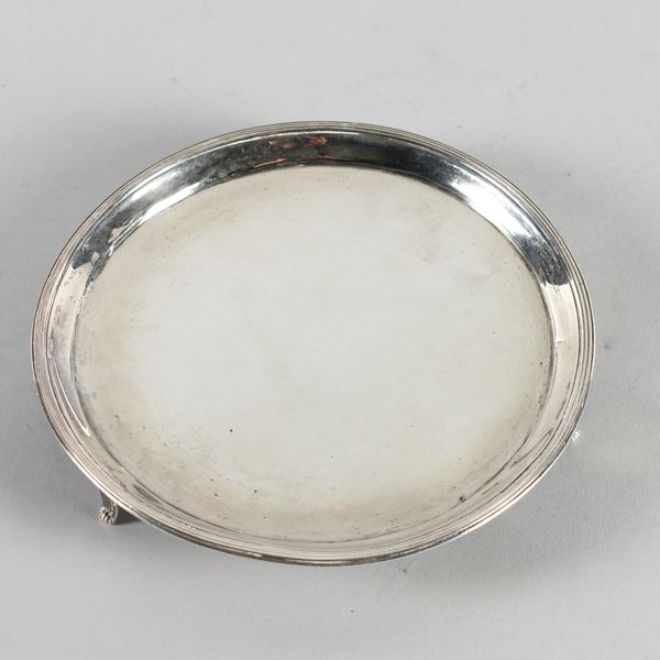 A GEORGE III SILVER CIRCULAR WAITER