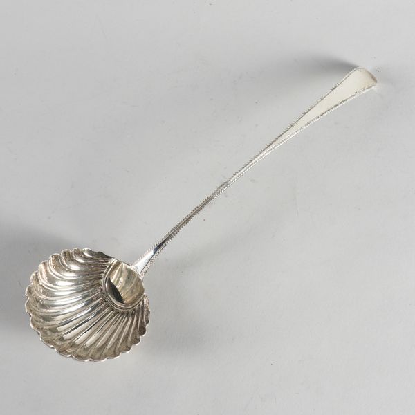 A SILVER BOTTOM MARKED SOUP LADLE