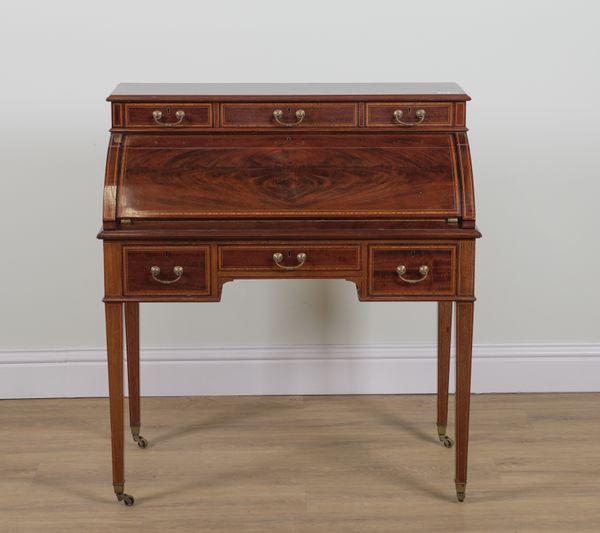 MAPLE AND CO; AN EDWARDIAN SATINWOOD BANDED MAHOGANY CYLINDER BUREAU