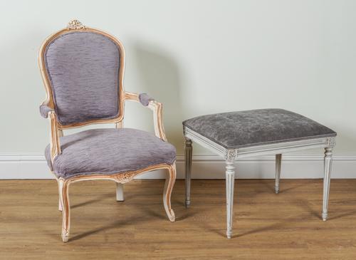 A LOUIS XV STYLE WHITE PAINTED UPHOLSTERED OPEN ARMCHAIR (2)