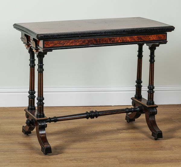 GILLOW AND CO; A MID 19TH CENTURY PARCEL GILT AMBOYNA AND EBONISED RECTANGULAR FOLD OVER CARD TABLE