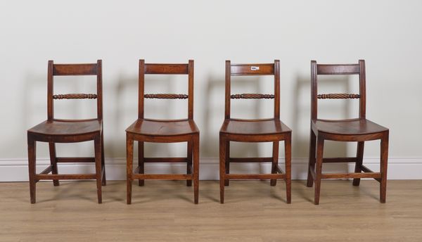 A SET OF FOUR EARLY 19TH CENTURY FRUITWOOD AND ELM ROPEBACK KITCHEN CHAIRS (4)