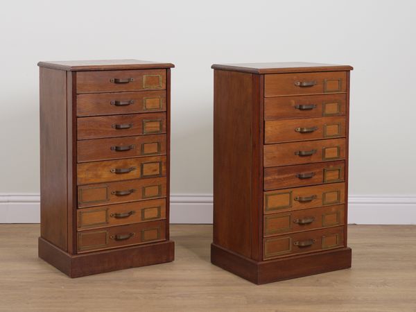 A PAIR OF MID 20TH CENTURY OAK EIGHT DRAWER CHESTS (2)