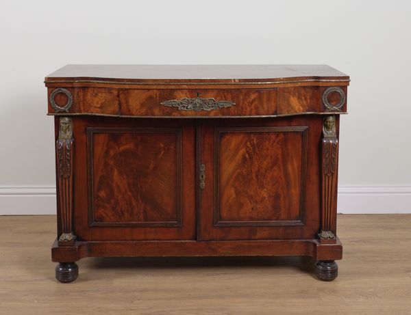 A REGENCY MAHOGANY BOWFRONT SIDEBOARD