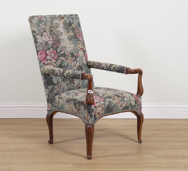 A LOUIS XV STYLE STAINED AND CARVED BEECH FRAMED OPEN ARMCHAIR