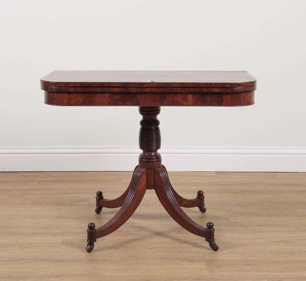 A LATE GEORGE III CROSS BANDED MAHOGANY FOLD-OVER TEA TABLE