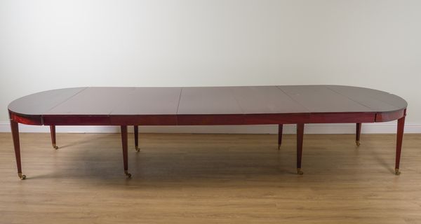 A DIRECTOIRE MAHOGANY EXTENDING DINING TABLE IN THE MANNER OF CHAPUIS