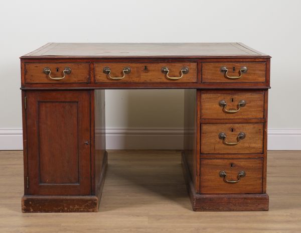 A GEORGE III MAHOGANY PARTNERS PEDESTAL DESK