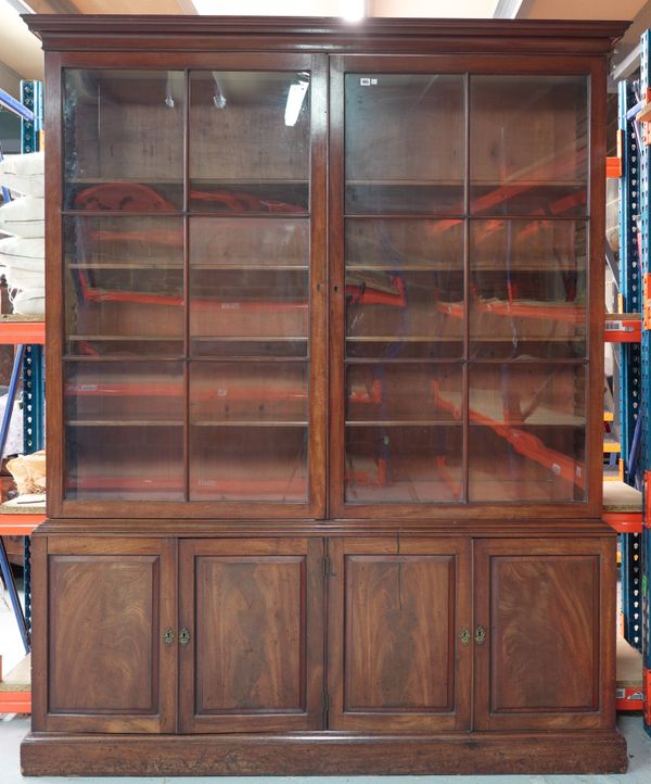 A GEORGE III MAHOGANY BOOKCASE CABINET