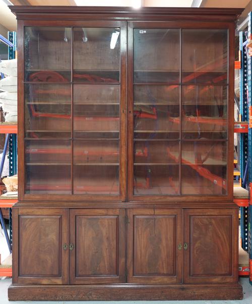 A GEORGE III MAHOGANY BOOKCASE CABINET