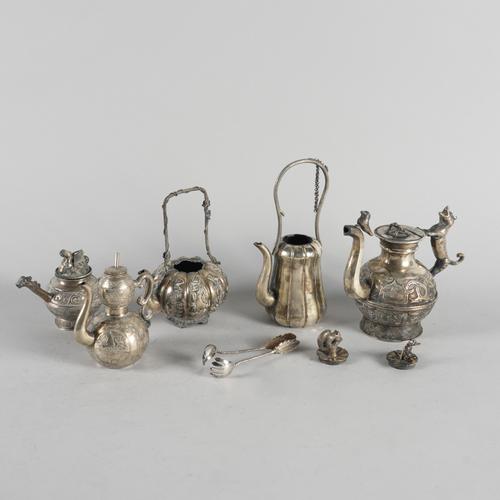 A GROUP OF FIVE ASIAN MINATURE TEA POTS AND A PAIR OF SUGAR TONGS (6)