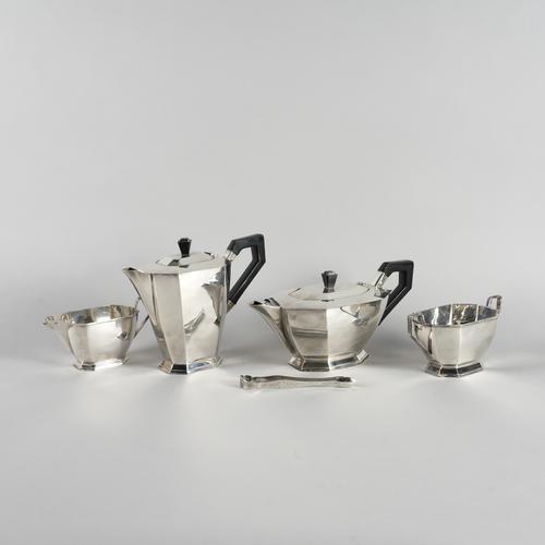 A SILVER FOUR PIECE TEA SET AND A PAIR OF SILVER SUGAR TONGS (5)