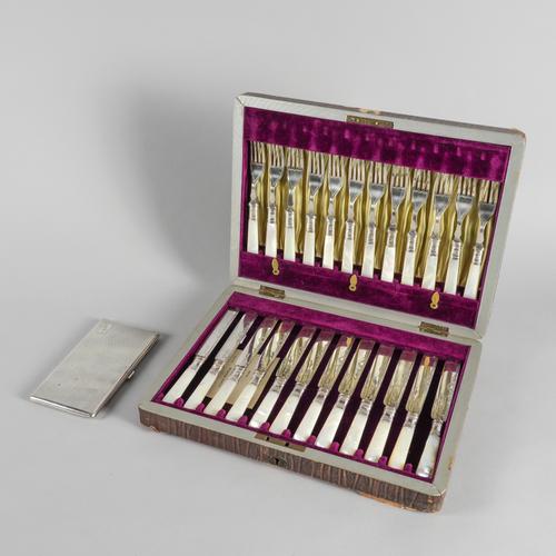 A FOREIGN CIGARETTE CASE AND A SET OF TWELVE PAIRS OF PLATED DESSERT KNIVES AND FORKS