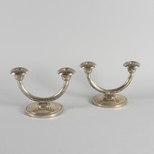 A PAIR OF NORWEGIAN CANDLESTICKS (2)