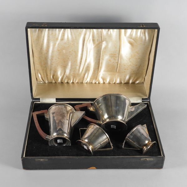 AN ART DECO SILVER FOUR PIECE TEA SET