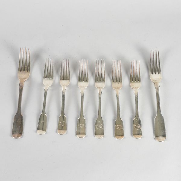 A GROUP OF SILVER FORKS (8)