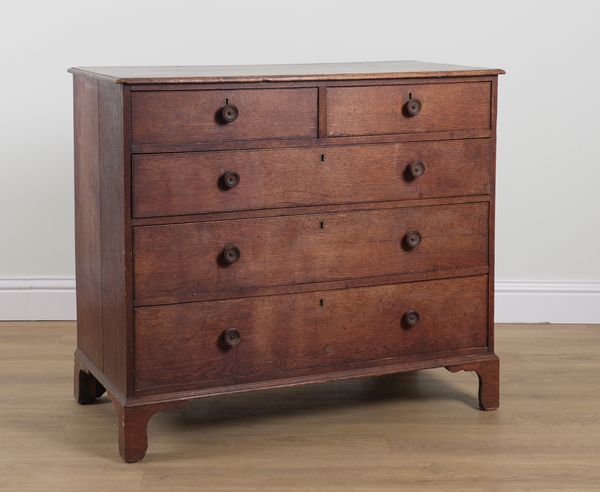 A GEORGE III OAK FIVE DRAWER CHEST