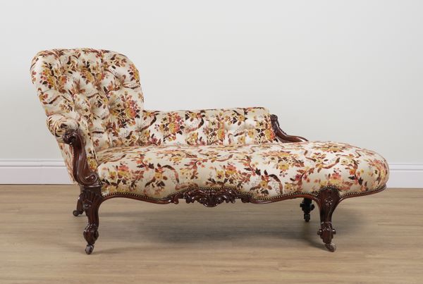 A VICTORIAN CARVED ROSEWOOD SPOONBACK CHAISE LONGUE