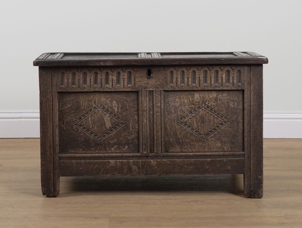 A 17TH CENTURY OAK PANELLED COFFER