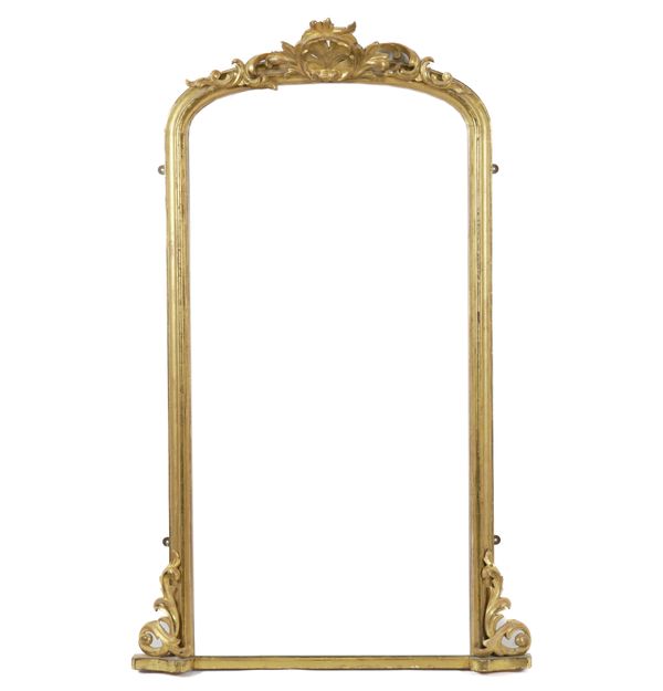 A VICTORIAN GILT FRAMED ARCH TOPPED OVERMANTEL MIRROR