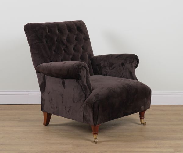 A BROWN UPHOLSTERED SQUARE BACK EASY ARMCHAIR