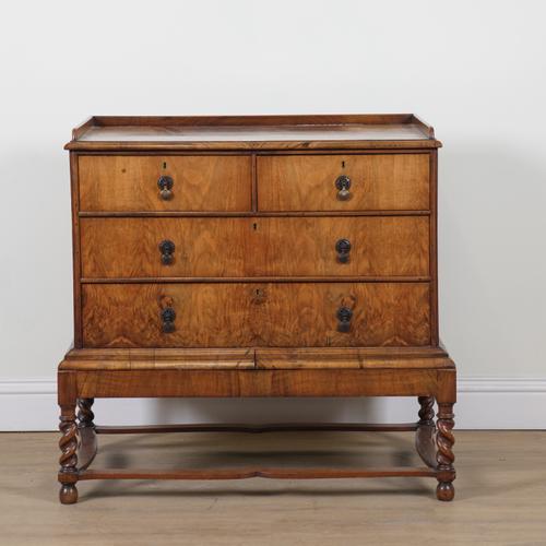 A 17TH CENTURY STYLE WALNUT CHEST ON STAND