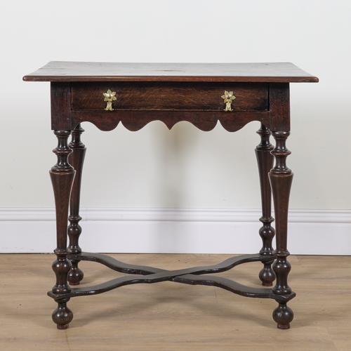 A 17TH CENTURY OAK SINGLE DRAWER SIDE TABLE