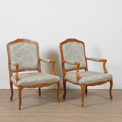 A PAIR OF LOUIS XV STYLE STAINED BEECH OPEN ARMCHAIRS (2)
