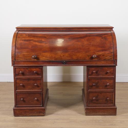 A VICTORIAN MAHOGANY ROLL TOP PEDESTAL DESK