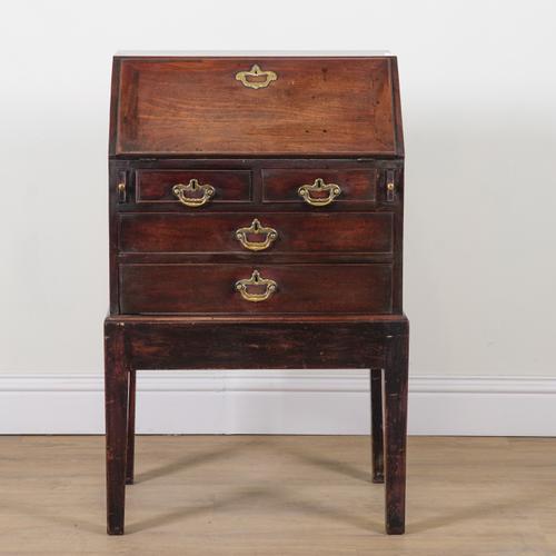 AN 18TH CENTURY MAHOGANY BUREAU ON STAND