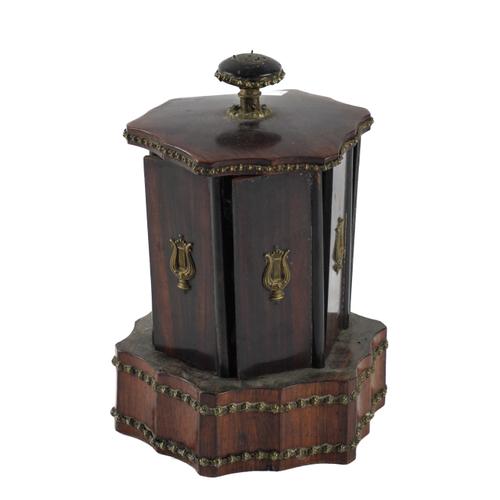 A VICTORIAN BRASS OAK MOUNTED TWIN -HANDLED TOBACCO COMPENDIUM