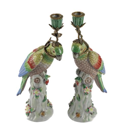 A PAIR OF MEISSEN STYLE PARROT CANDLESTICKS (2)