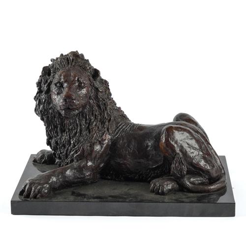 BARBARA GAIL HARRISON (AUSTRALIAN): A BRONZE SCULPTURE OF A RECUMBENT LION