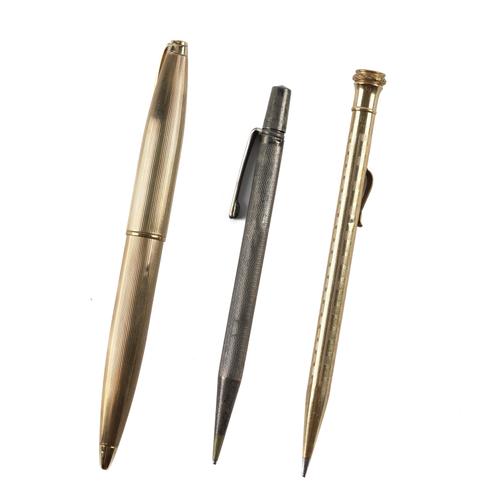 A 9CT GOLD BIRO BALLPOINT PEN, A SILVER YARD-O-LED PROPELLING PENCIL AND A PLATED WAHL-EVERSHARP PROPELLING PENCIL (3)