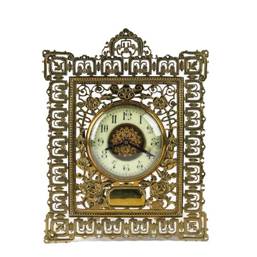 A BRASS EASEL CLOCK