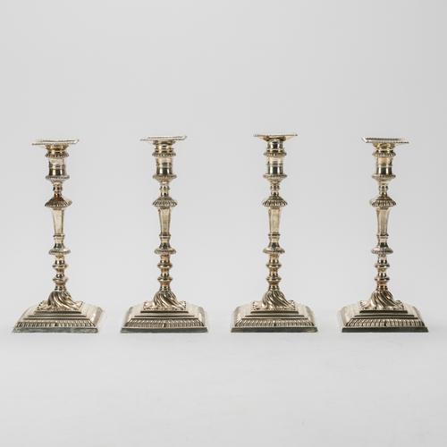 A SET OF FOUR EARLY GEORGE III SILVER TABLE CANDLESTICKS (4)