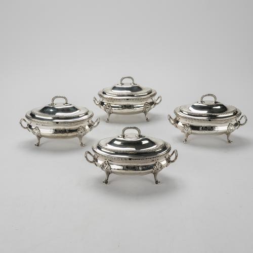 A SET OF FOUR VICTORIAN SILVER TWIN HANDLED SAUCE TUREENS AND COVERS (4)