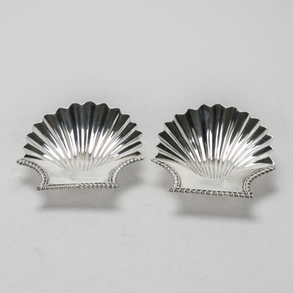 TWO SIMILAR GEORGE IV SILVER BUTTER SHELLS (2)