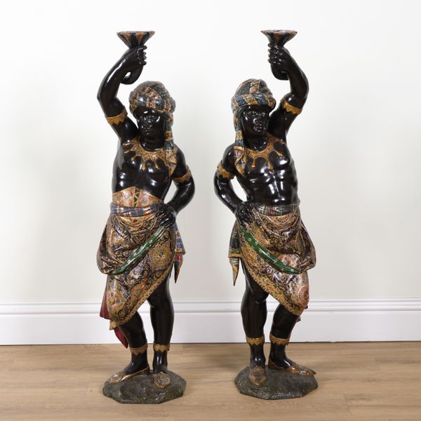 A PAIR OF LATE 19TH CENTURY VENETIAN CARVED AND POLYCHROME PAINTED MOOR FIGURAL TORCHERE STANDS