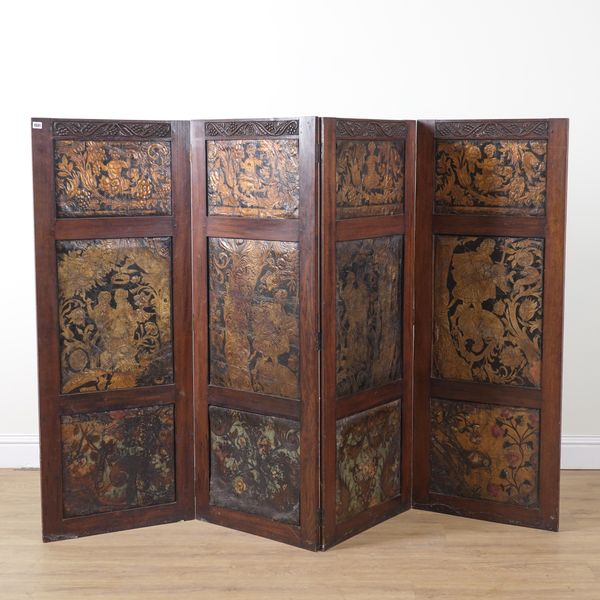 AN ARTS AND CRAFTS OAK FRAMED FOUR FOLD DRAUGHT SCREEN