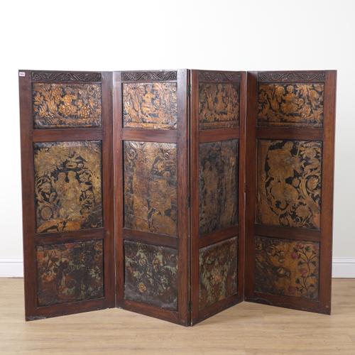 AN ARTS AND CRAFTS OAK FRAMED FOUR FOLD DRAUGHT SCREEN