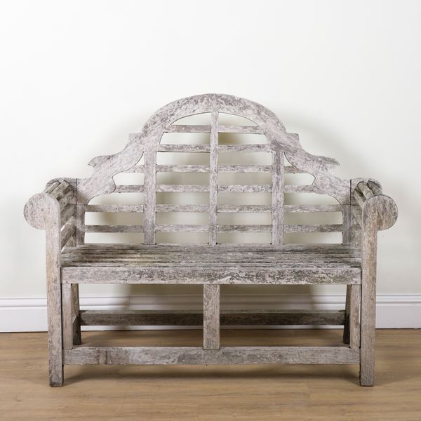 A LUTYENS HARDWOOD GARDEN BENCH
