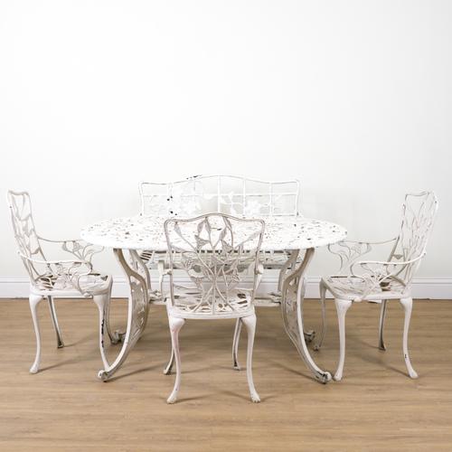 A WHITE PAINTED FLORAL CAST OVAL ALUMINIUM TABLE (5)