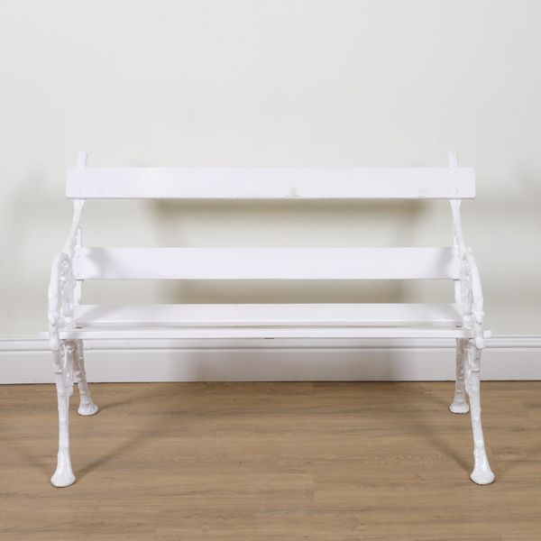FALKIRK FOUNDRY 1865; A PAIR OF WHITE PAINTED CAST IRON BENCHES IN THE BERRY AND BRAMBLE PATTERN (2)