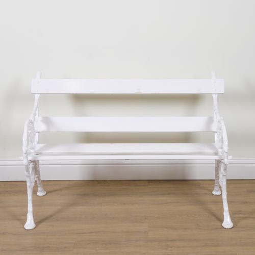 FALKIRK FOUNDRY 1865; A PAIR OF WHITE PAINTED CAST IRON BENCHES IN THE BERRY AND BRAMBLE PATTERN (2)