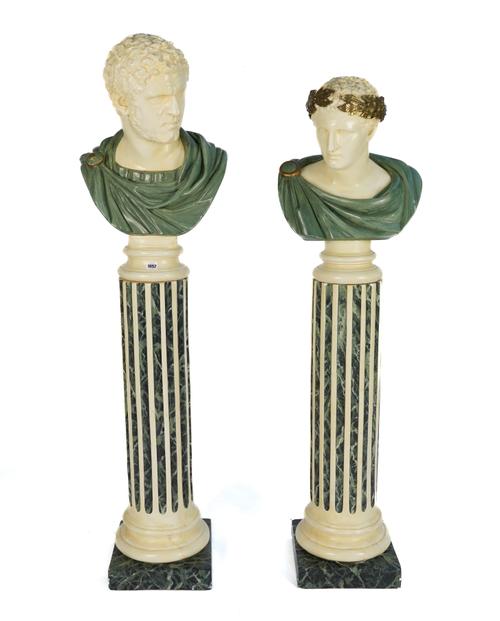 A PAIR OF PLASTER PAINTED ROMAN BUSTS ON COLUMN BASES (4)