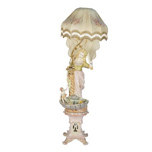 A CERAMIC STANDARD LAMP/WATER FEATURE