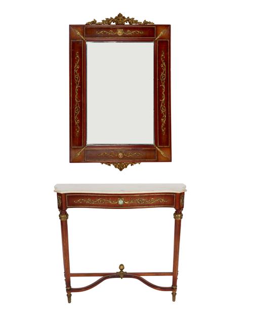 A GILT METAL MOUNTED MAHOGANY MARBLE TOPPED SERPENTINE FRONTED CONSOLE TABLE (2)